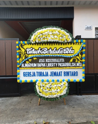 Papan Bunga Duka di Pino Raya
